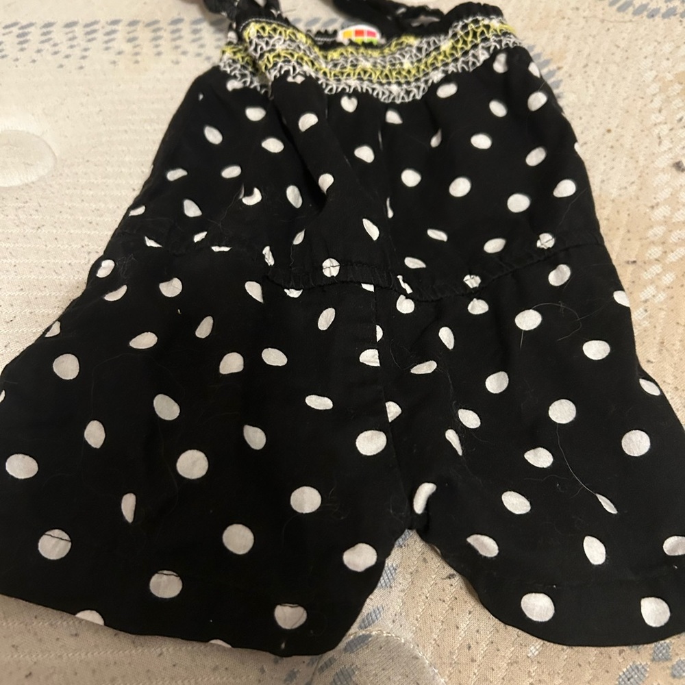 It is a baby girl romper